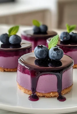 Irresistible Creamy Mini Blueberry Mousse Cakes with Mirror Glaze