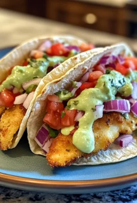 Crispy Zesty Baja Fish Tacos with Avocado Crema